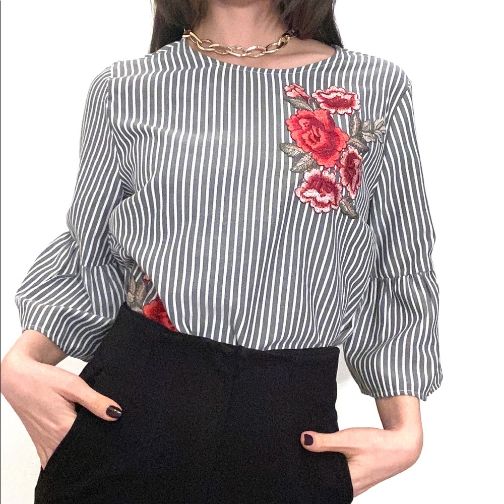 Grey and white striped top with floral embroidery